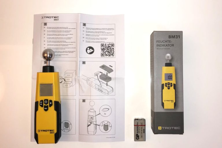 Das TROTEC BM31 Feuchtigkeitsmessgerät mit Verpackung, Anleitung und 9 V Batterie im Test